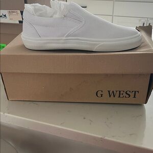 Vans White Slip-On Canvas Sneakers